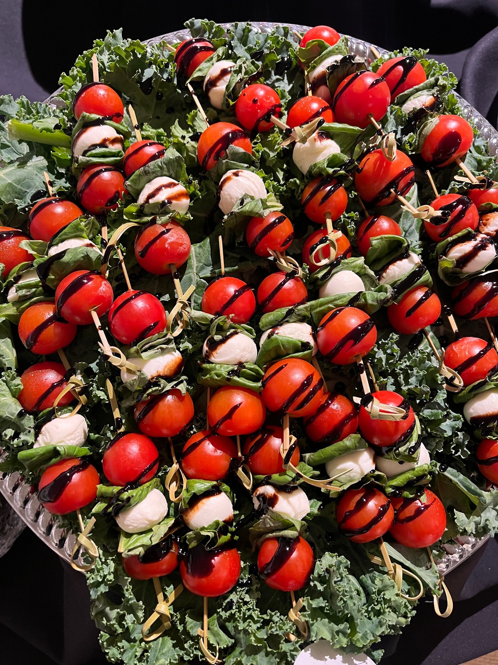 Caprese skewers with cherry tomatoes and mozzarella