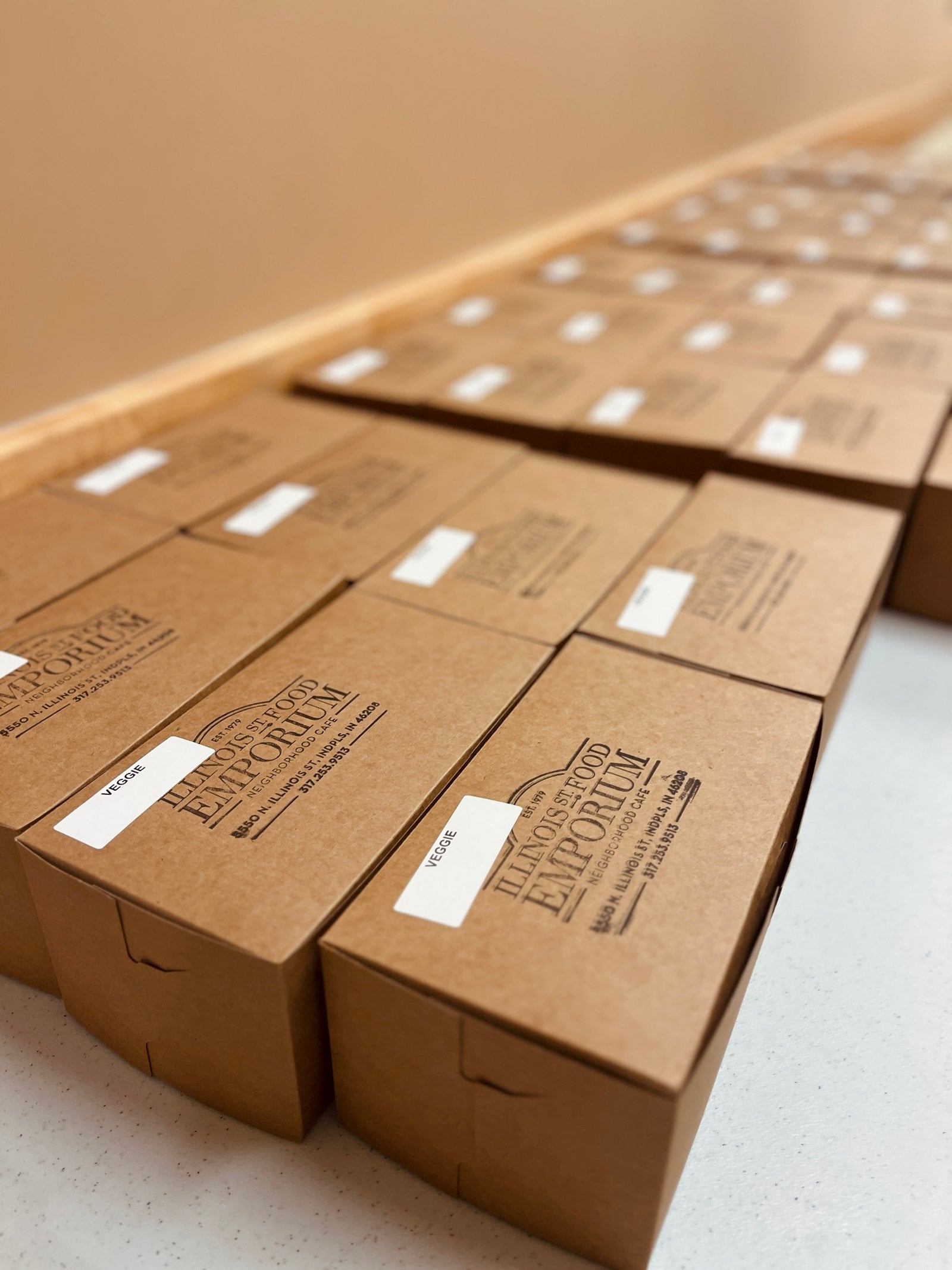 Boxed catering lunches lined up and ready for an event